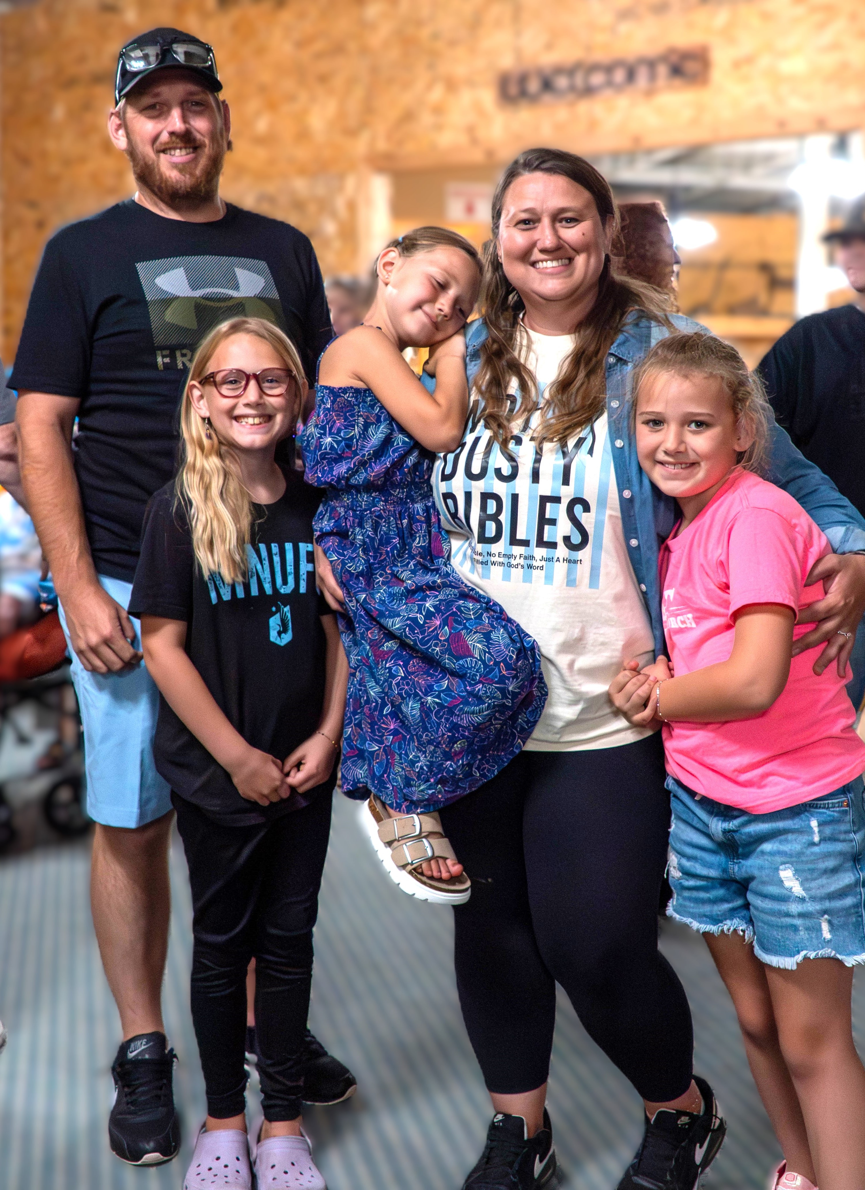 Cowboy Church guests and church family smiling together